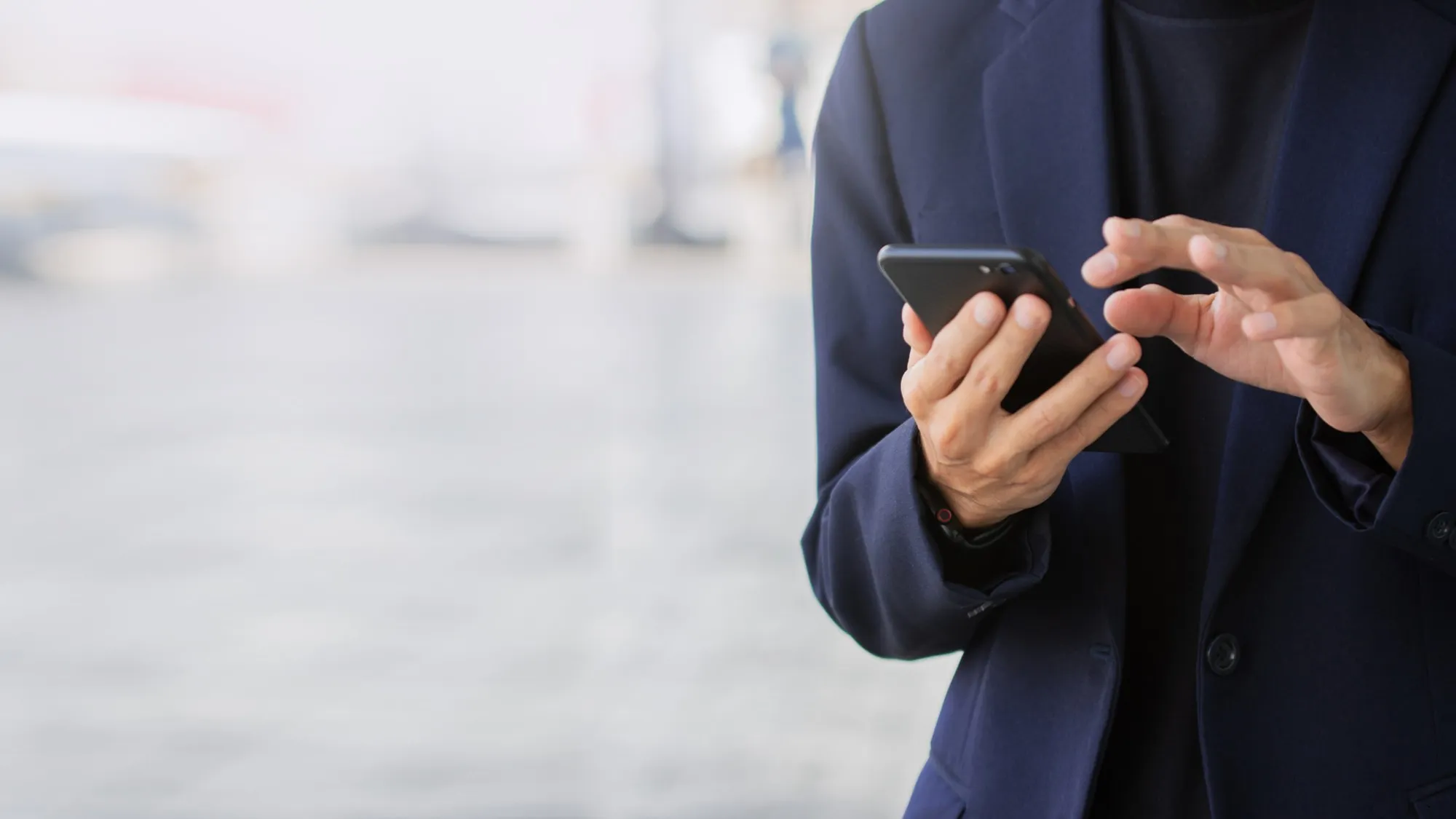 Customer using smartphone during delivery process
